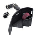 Enhanced car air intake system components: a black air filter housing with a pink filter, rubber hoses, and metal clamps.